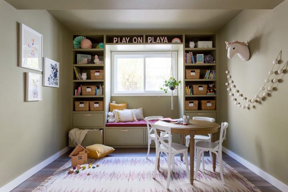 Transitional kids' playroom in Orange County with green walls for kids 4-10 years old and girls.