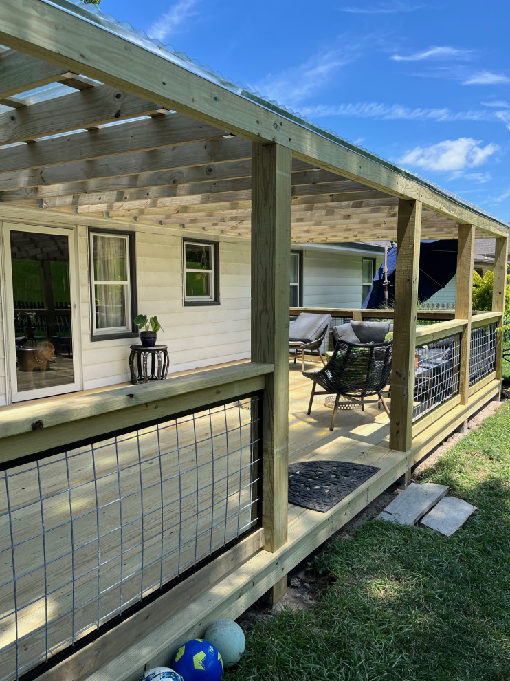 Covered Ground-Level Deck in Lake Waukomis, MO