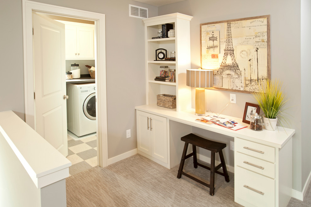 Hallway - transitional carpeted and beige floor hallway idea in Minneapolis with gray walls