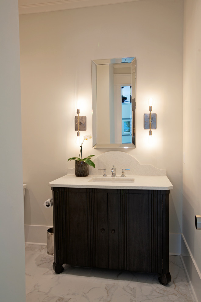 Inspiration for a large transitional powder room in Atlanta with an undermount sink, dark wood cabinets, white walls, marble floors and quartzite benchtops.
