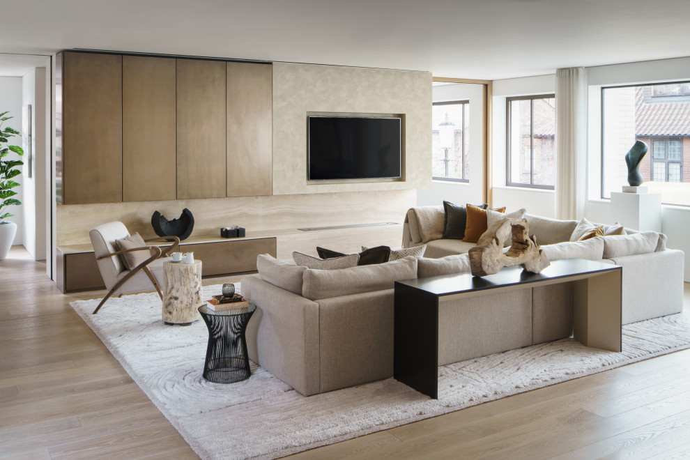 Photo of a large contemporary open plan living room in London with beige walls and a ribbon fireplace.