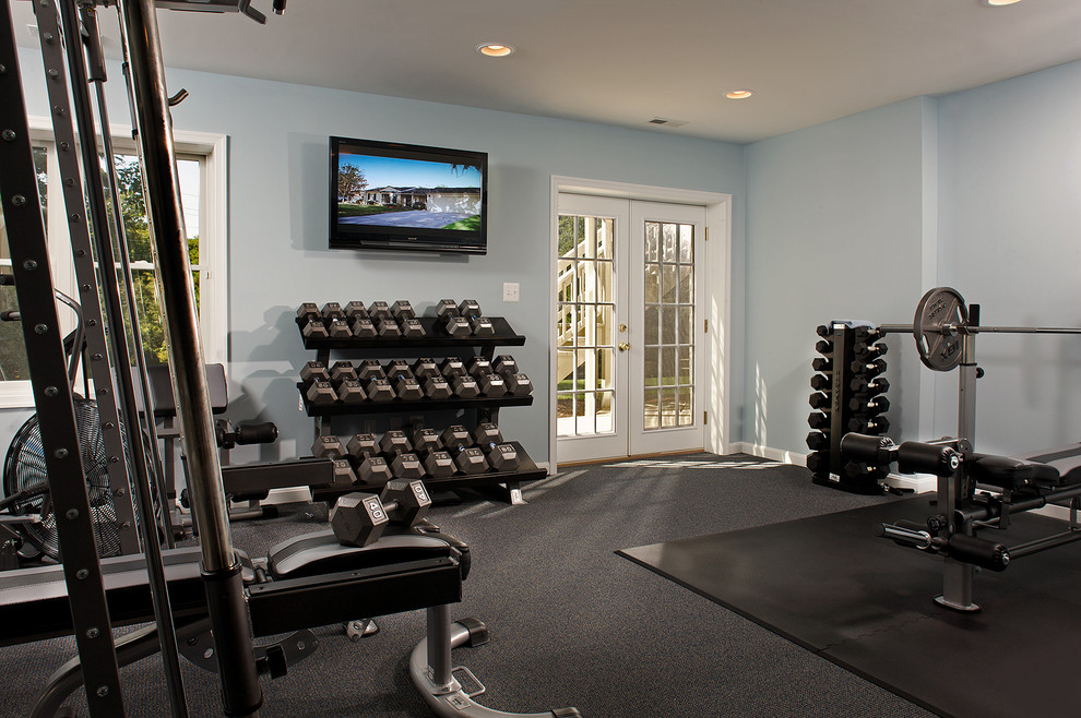Design ideas for a mid-sized traditional home weight room in Baltimore with blue walls.