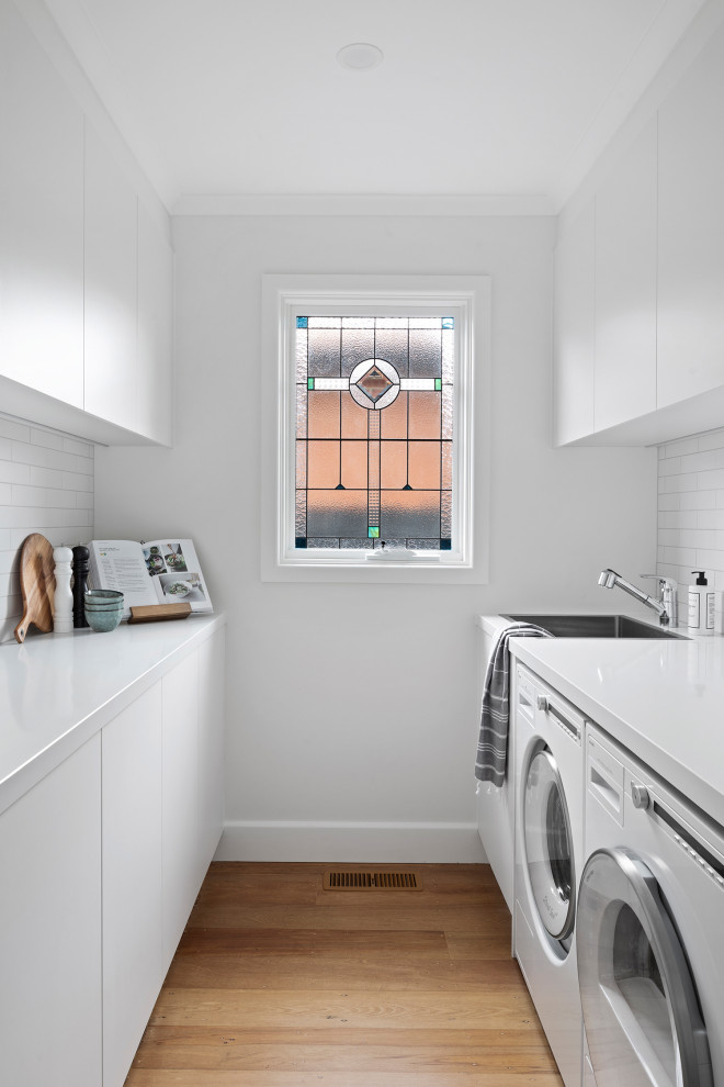 Design ideas for a contemporary laundry room in Melbourne.