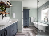 Farmhouse Bathroom by Rockwood Cabinetry