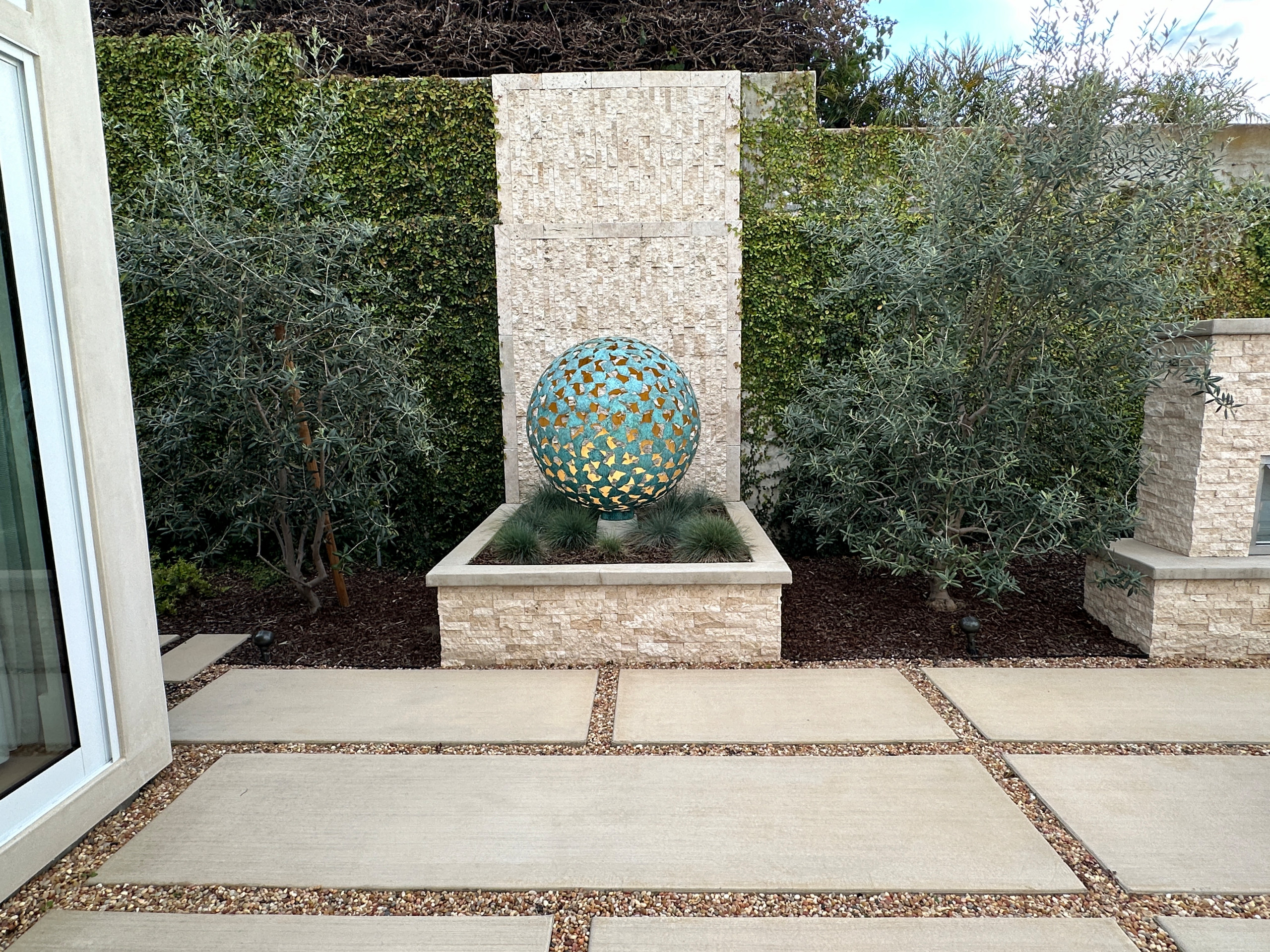 Backyard Patio Remodel with Lighting and Sculpture