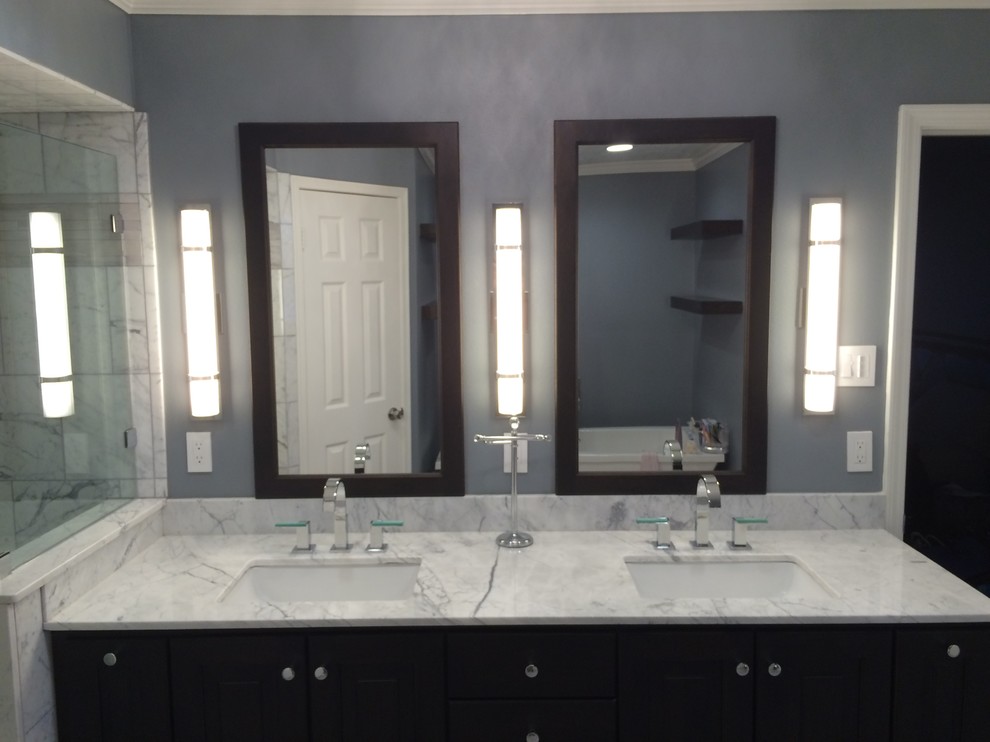 Photo of a mid-sized transitional master bathroom in Houston with raised-panel cabinets, dark wood cabinets, marble benchtops, an undermount sink, grey walls, white tile and marble.