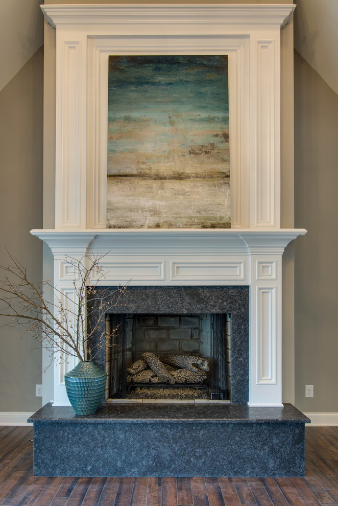 Inspiration for a mid-sized traditional formal enclosed living room in Nashville with grey walls, dark hardwood floors, a standard fireplace, a stone fireplace surround and no tv.