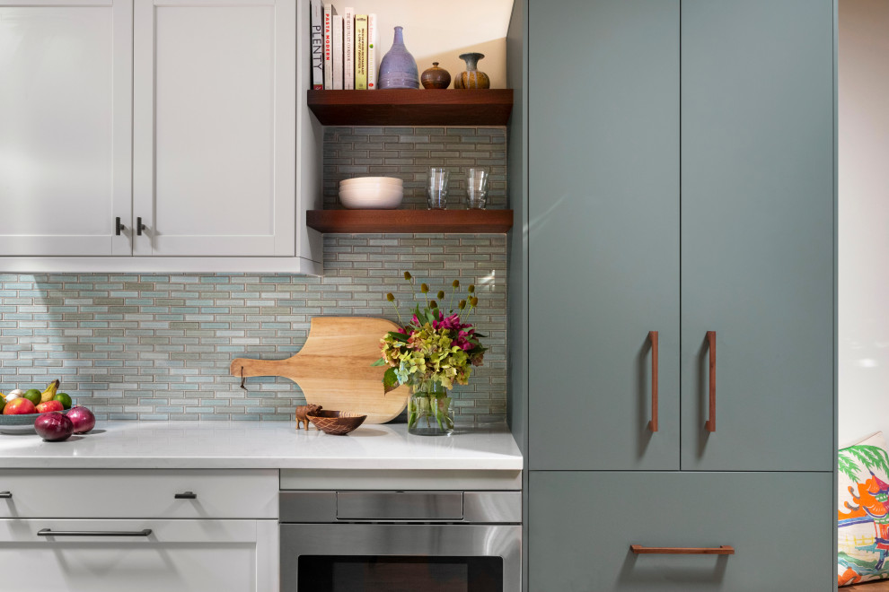 Inspiration for a small transitional galley separate kitchen in Seattle with an undermount sink, shaker cabinets, grey cabinets, quartz benchtops, blue splashback, ceramic splashback, stainless steel appliances, bamboo floors, no island, orange floor and white benchtop.