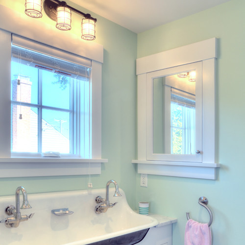 Inspiration for a beach style kids bathroom in Bridgeport with shaker cabinets, white cabinets, green walls, a drop-in sink and marble benchtops.