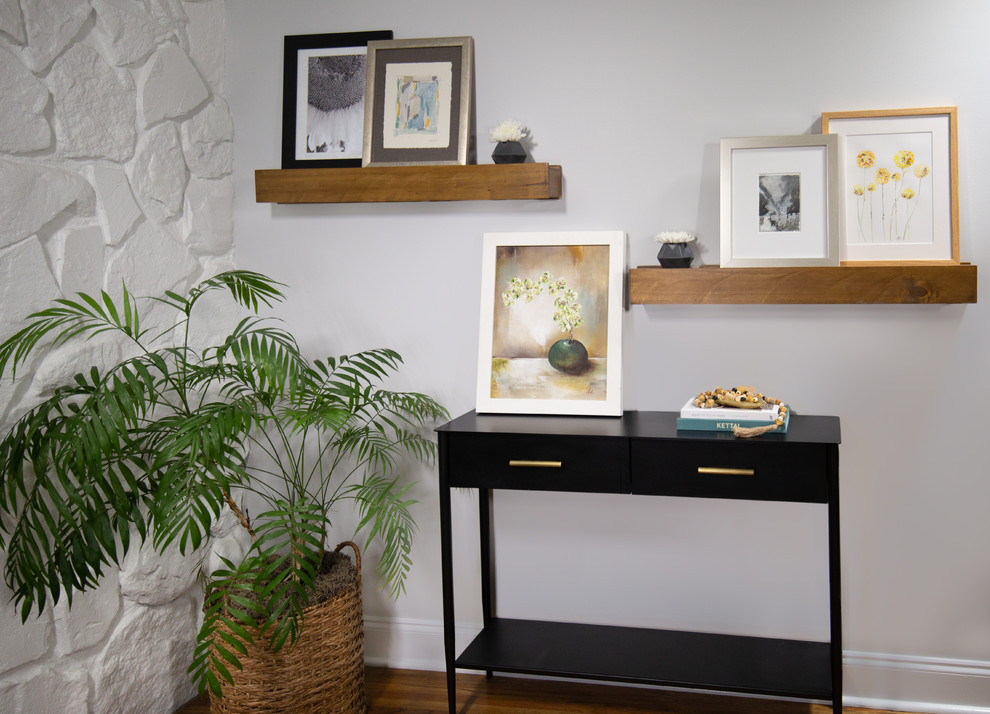 Large mountain style l-shaped entryway photo in Charlotte with a farmhouse sink, raised-panel cabinets, gray cabinets, quartz countertops, white backsplash, ceramic backsplash, stainless steel appliances, an island and white countertops