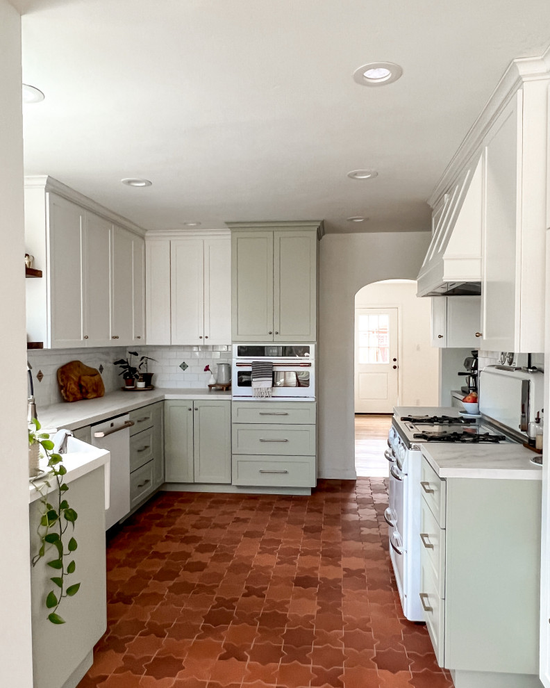 1950s ceramic tile and brown floor kitchen photo in San Francisco
