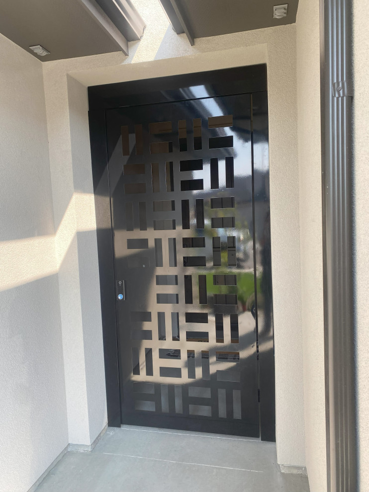 Front door - mid-sized modern front door idea in Boise