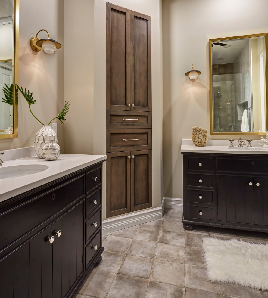 This is an example of a mid-sized eclectic master bathroom with furniture-like cabinets, brown cabinets, an alcove shower, a two-piece toilet, white tile, ceramic tile, an undermount sink, engineered quartz benchtops, a hinged shower door, white benchtops, a double vanity and a freestanding vanity.