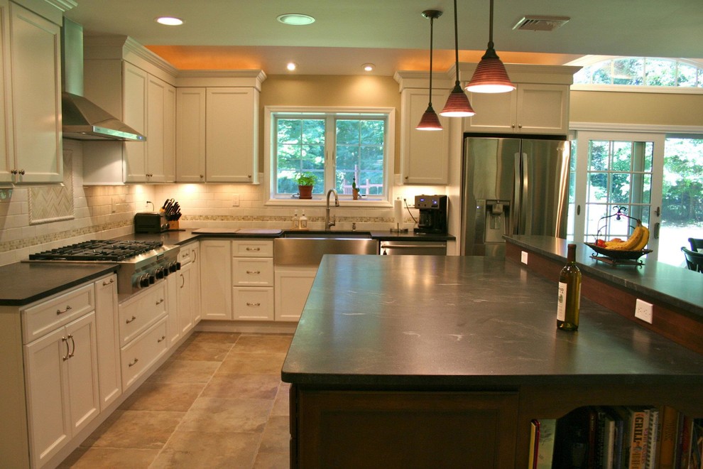 Example of a transitional kitchen design in New York