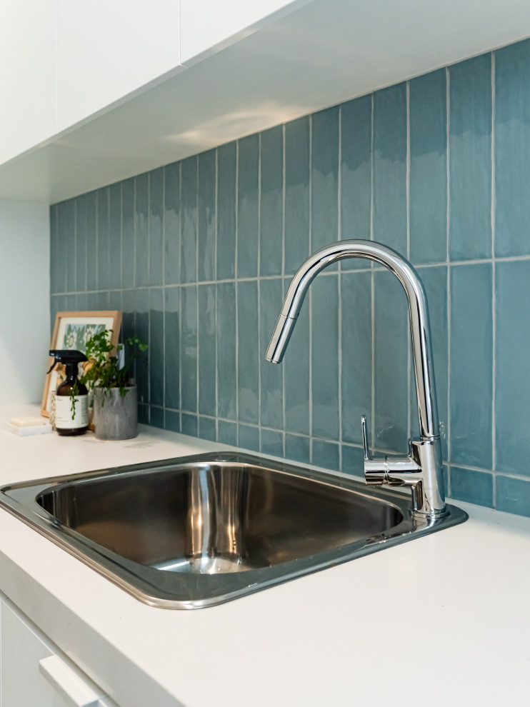 Design ideas for a contemporary laundry room in Melbourne.