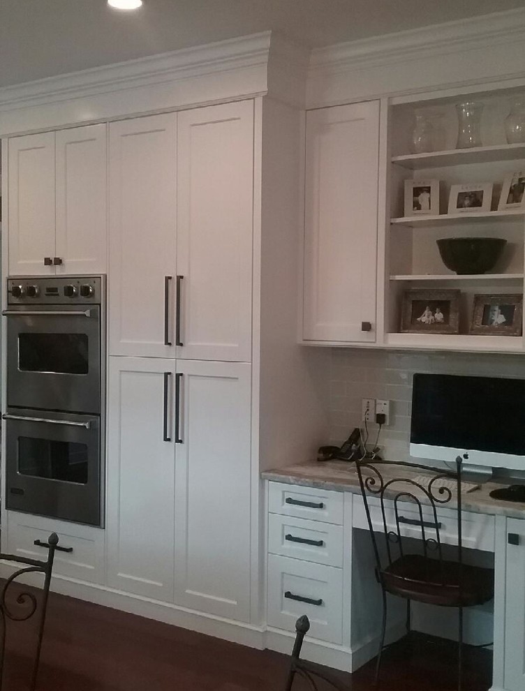 Inspiration for a transitional kitchen remodel in Boston with recessed-panel cabinets