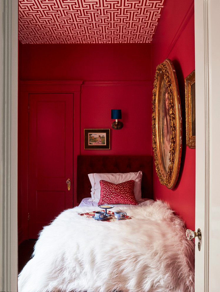 Inspiration for an eclectic bedroom in Chicago with red walls and wallpaper.