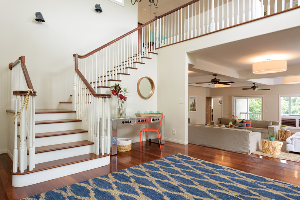Design ideas for a beach style wood staircase in Hawaii with painted wood risers.