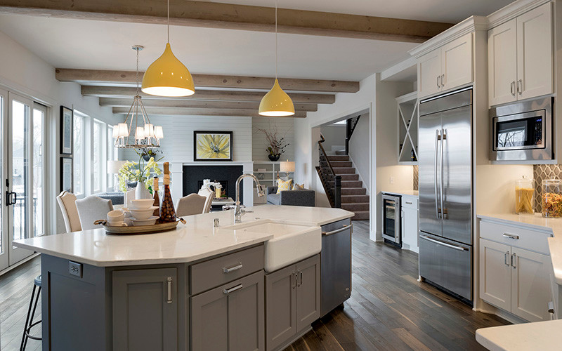This is an example of an eclectic open plan kitchen in Minneapolis with with island.