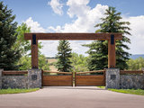 Farmhouse Landscape by Designscapes Colorado Inc.