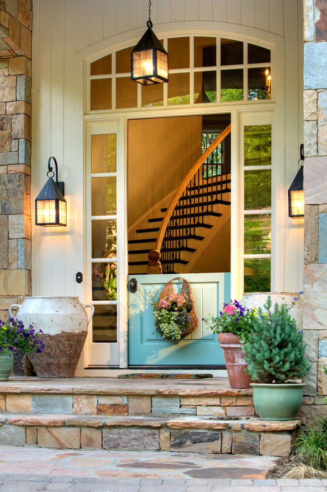 Traditional entryway in Denver with a dutch front door.