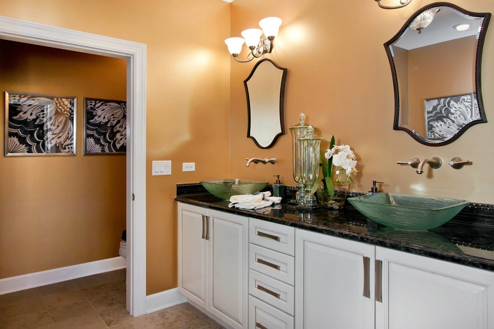 Bathroom - large transitional master porcelain tile bathroom idea in Chicago with raised-panel cabinets, white cabinets, orange walls, a vessel sink and granite countertops
