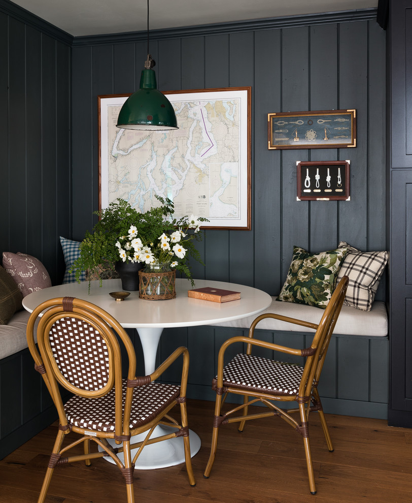 Kitchen/dining room combo - rustic medium tone wood floor and brown floor kitchen/dining room combo idea in Seattle with green walls