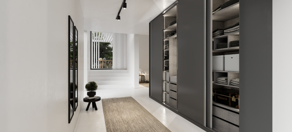 Design ideas for a mid-sized modern storage and wardrobe in Toronto.