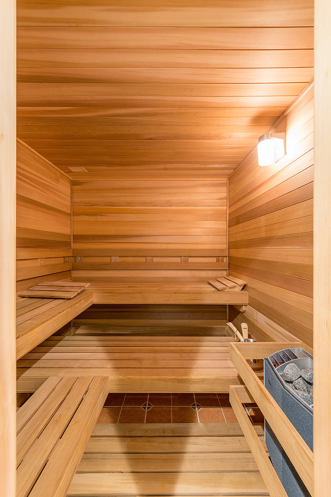 This is an example of a transitional bathroom in New York with with a sauna.