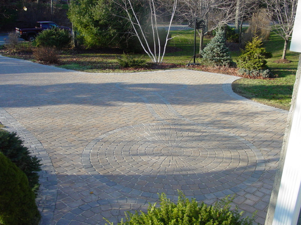Inspiration for a front yard brick driveway in Boston.