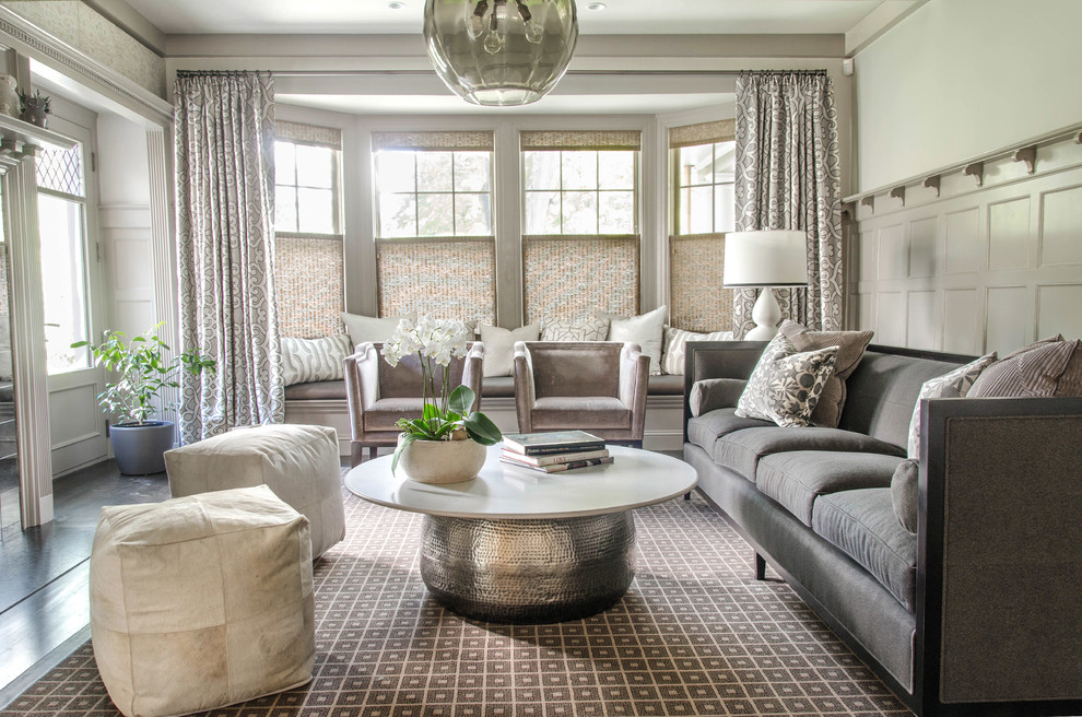 Inspiration for a transitional living room in Boston with white walls.