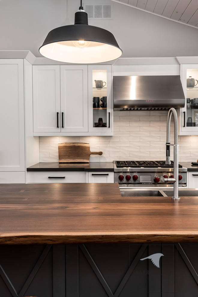 Example of a transitional kitchen design in Toronto