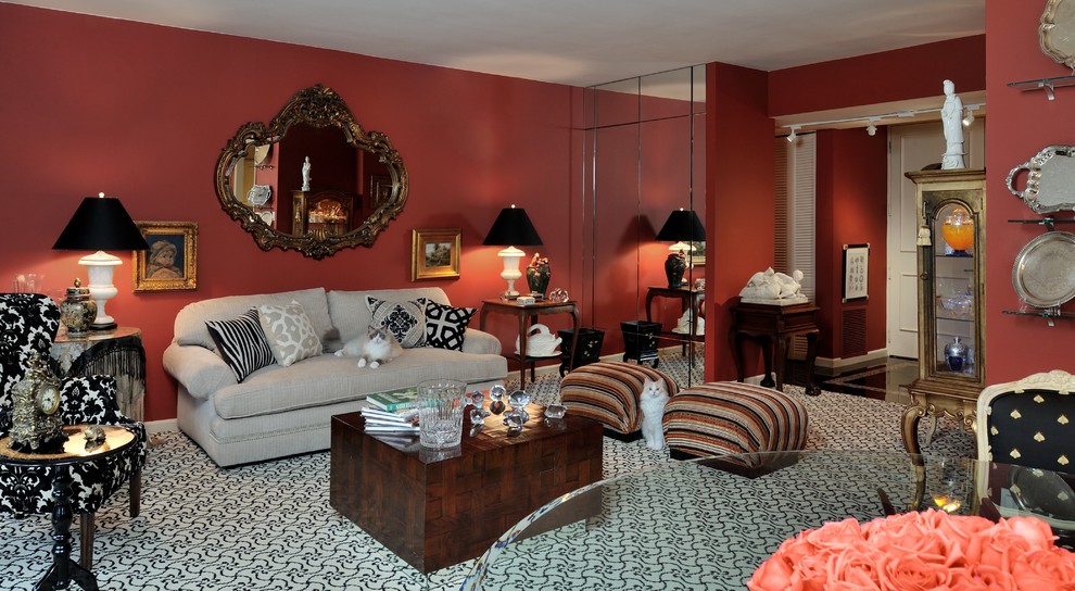 This is an example of a small traditional open concept living room in Houston with red walls and carpet.