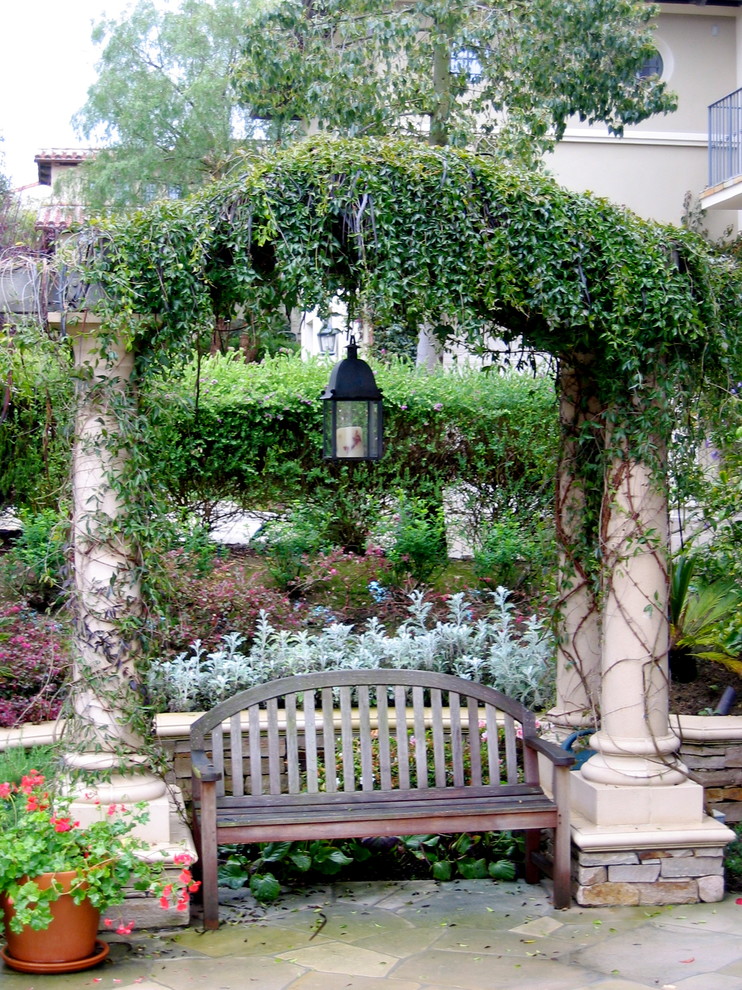 This is an example of a traditional backyard garden in Orange County.