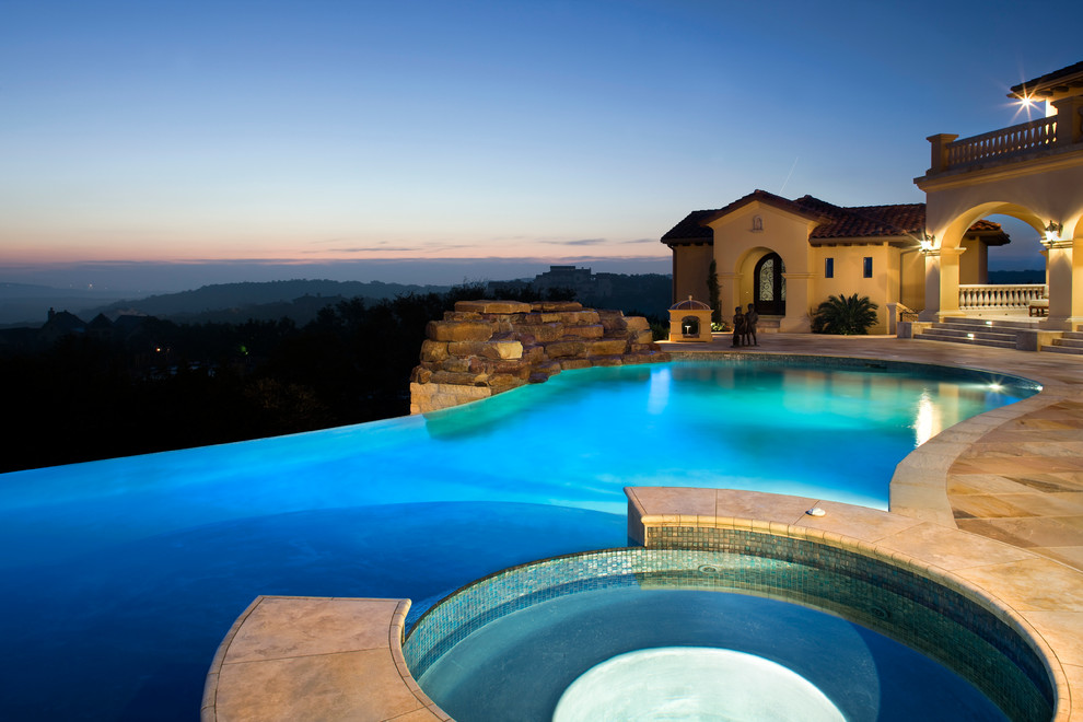Inspiration for a mediterranean swimming pool in Austin.