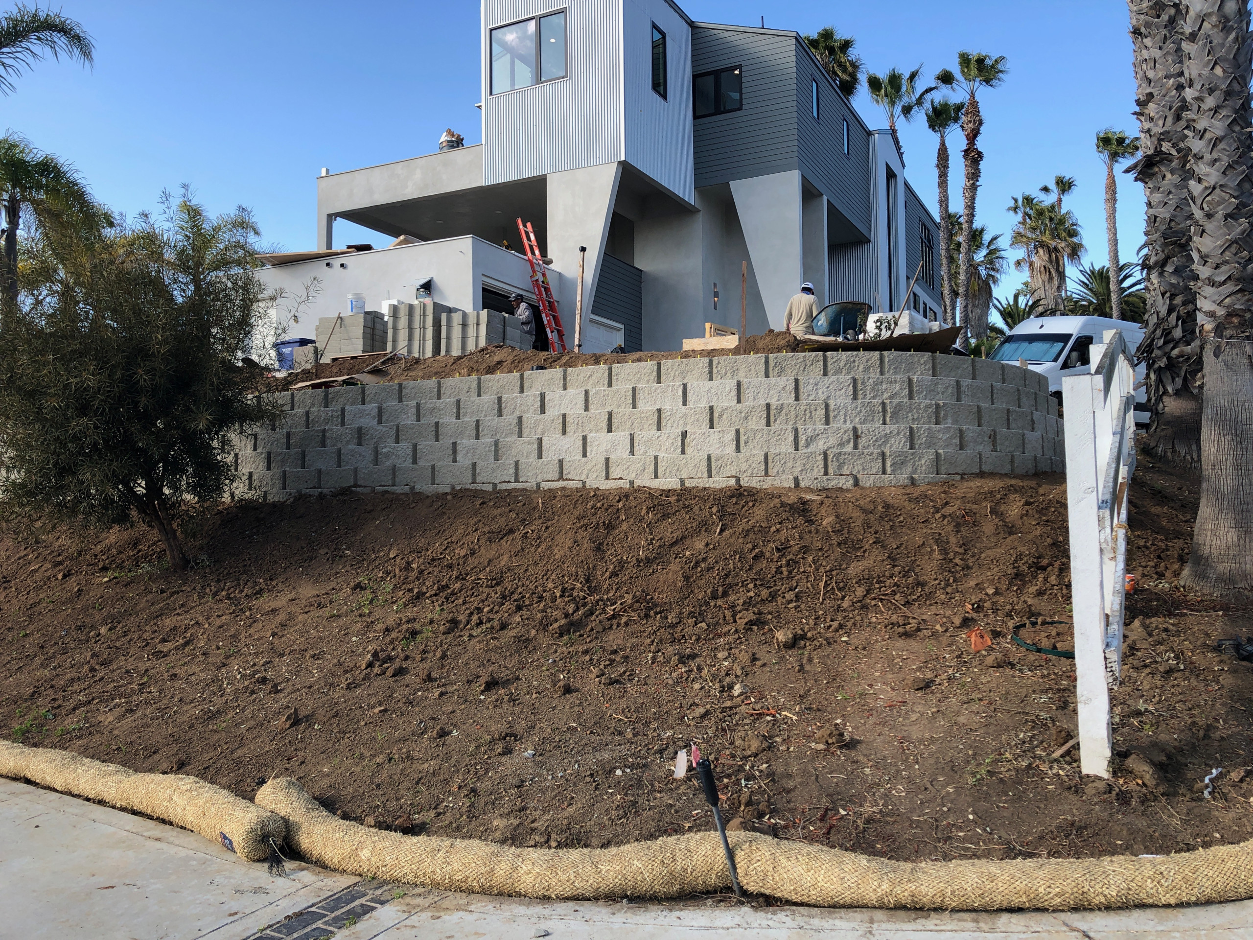 Installing Two Large Retaining Walls on a Slope in Del Mar