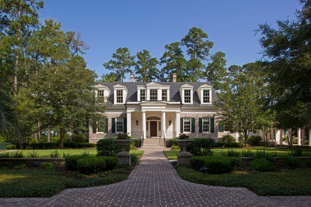 Traditional two-storey beige exterior in Charleston.