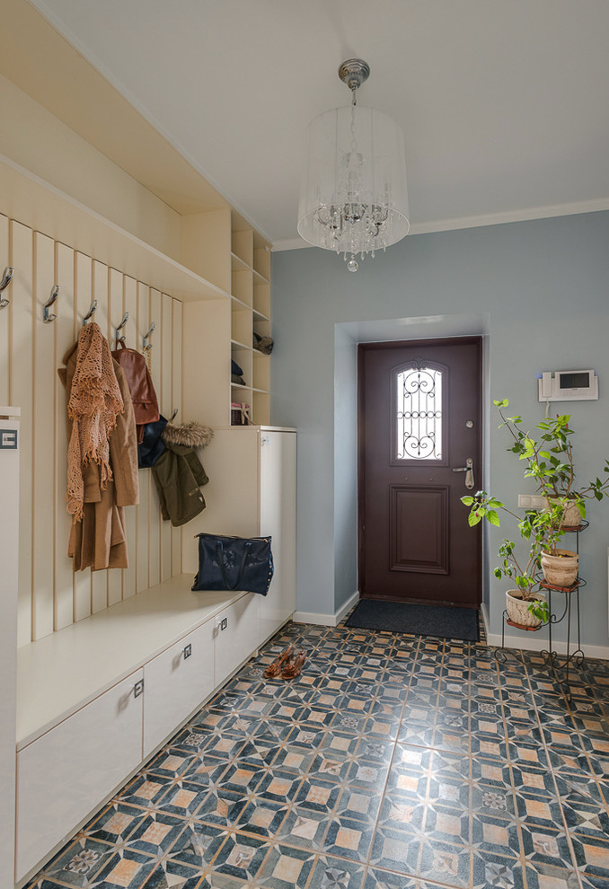 Design ideas for a large eclectic front door in Moscow with blue walls, a single front door, a brown front door and multi-coloured floor.