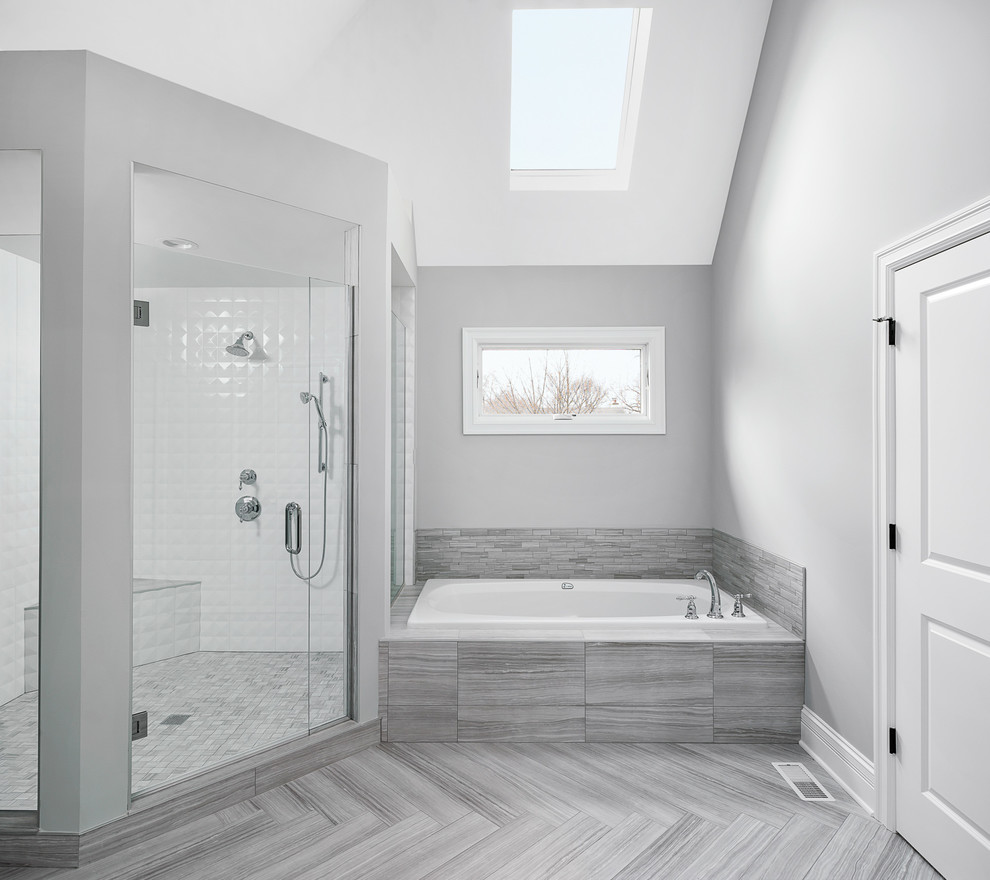 Inspiration for a large transitional master bathroom in Chicago with a drop-in tub, a corner shower, white tile and a hinged shower door.