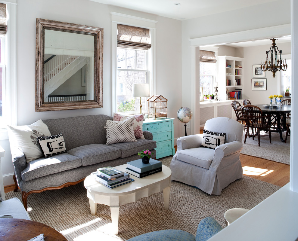 Photo of a mid-sized shabby-chic style living room in DC Metro with medium hardwood floors.