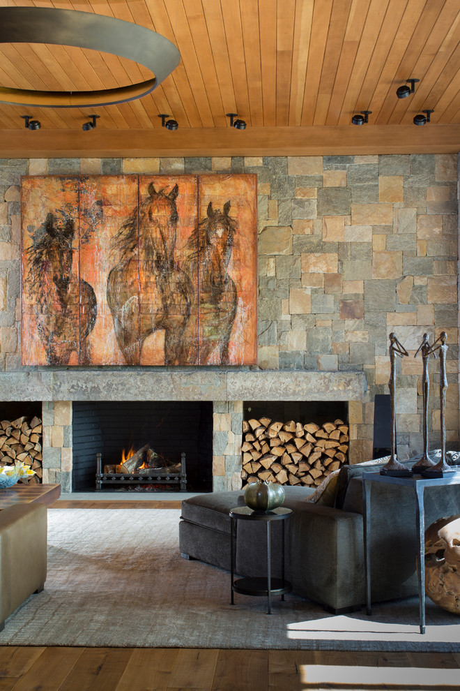 This is an example of a country living room in Baltimore with a standard fireplace.