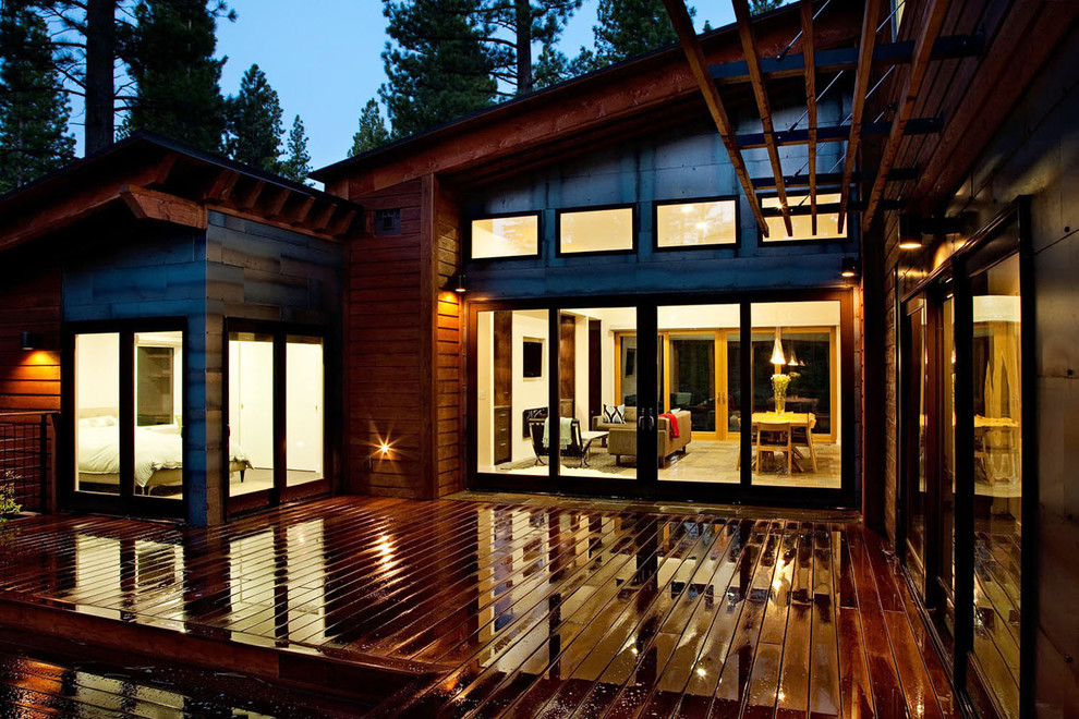 This is an example of a contemporary exterior in Sacramento with wood siding.