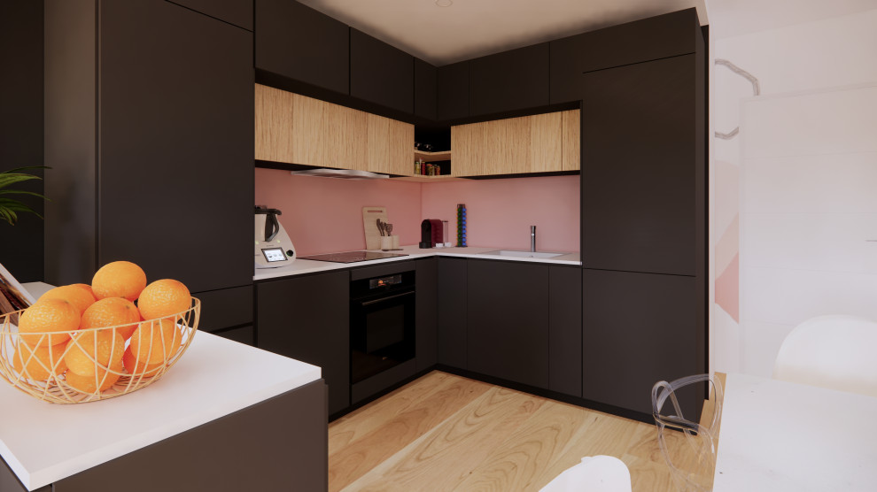 Идея дизайна: кухня-гостиная в стиле модернизм с одинарной мойкой, плоскими фасадами, черными фасадами, столешницей из ламината, розовым фартуком, полом из ламината, коричневым полом и белой столешницей без острова