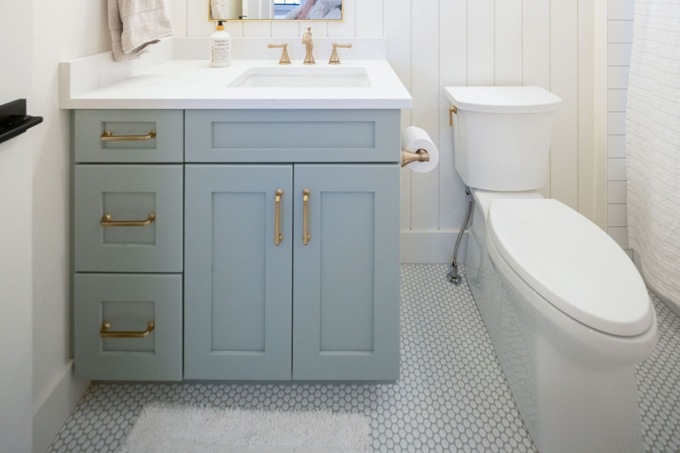 Bathroom - large farmhouse 3/4 mosaic tile floor, white floor, single-sink and wall paneling bathroom idea in Other with shaker cabinets, blue cabinets, white walls, quartz countertops, white countertops and a built-in vanity
