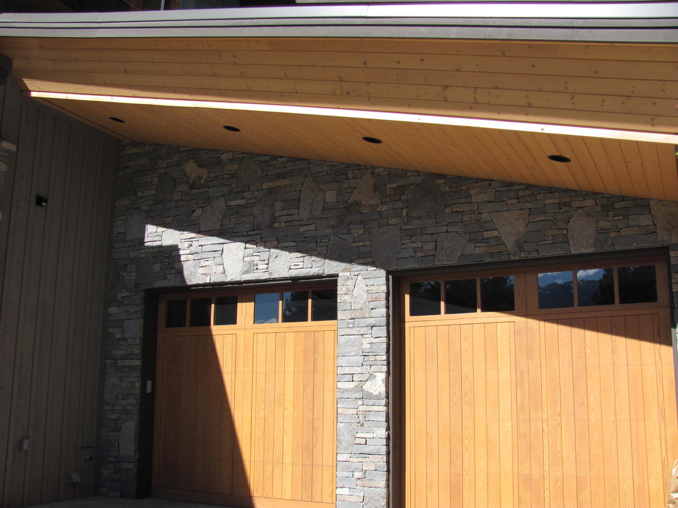 Home design - large rustic home design idea in Vancouver