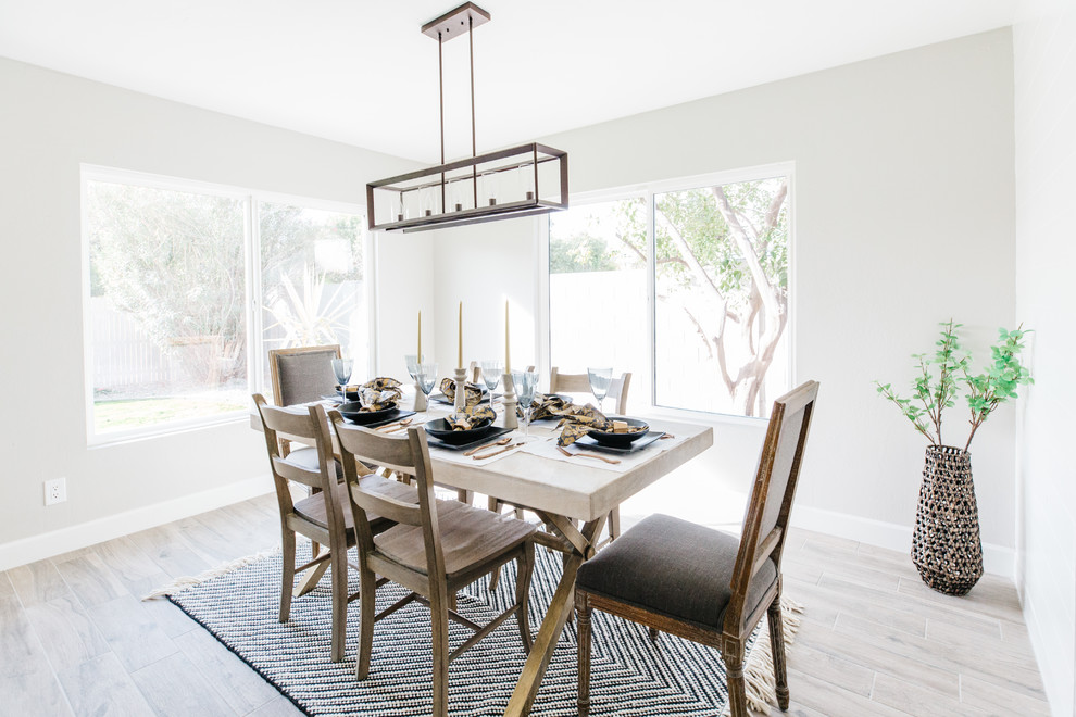 Mid-sized transitional separate dining room in Phoenix with grey walls, porcelain floors and grey floor.