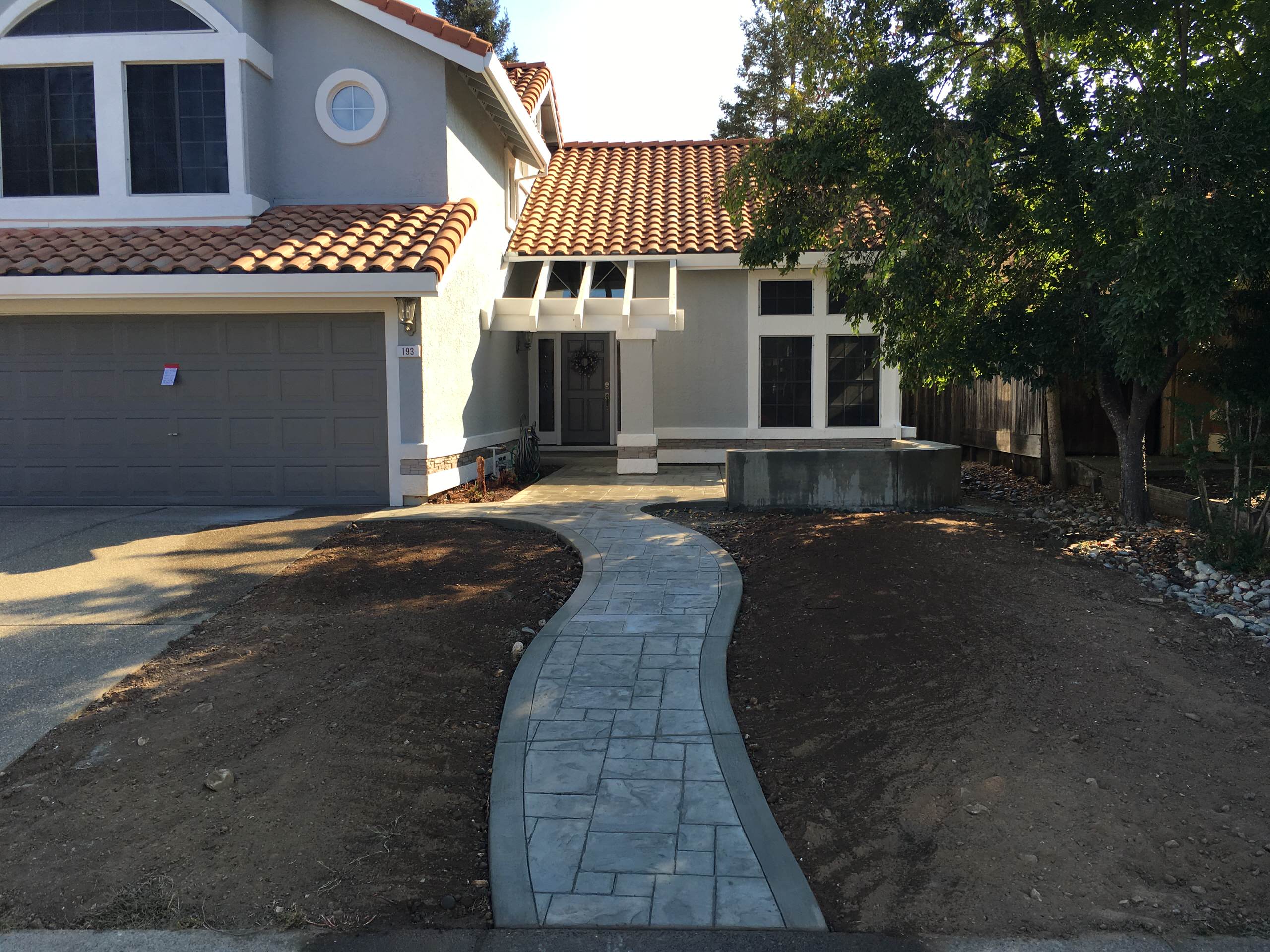 The Gallo's wanted a walkway and seat walls in their front yard