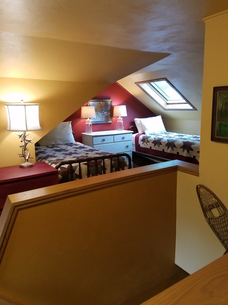 Inspiration for a small rustic guest home design remodel with yellow walls