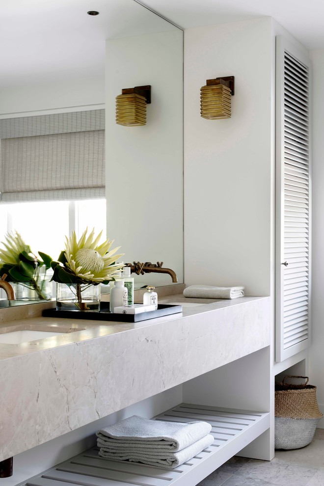 Inspiration for a contemporary bathroom in Sydney with an undermount sink and white walls.