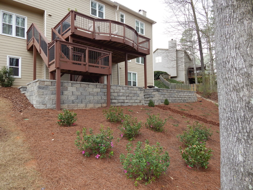 Block wall and tumbled paver patio